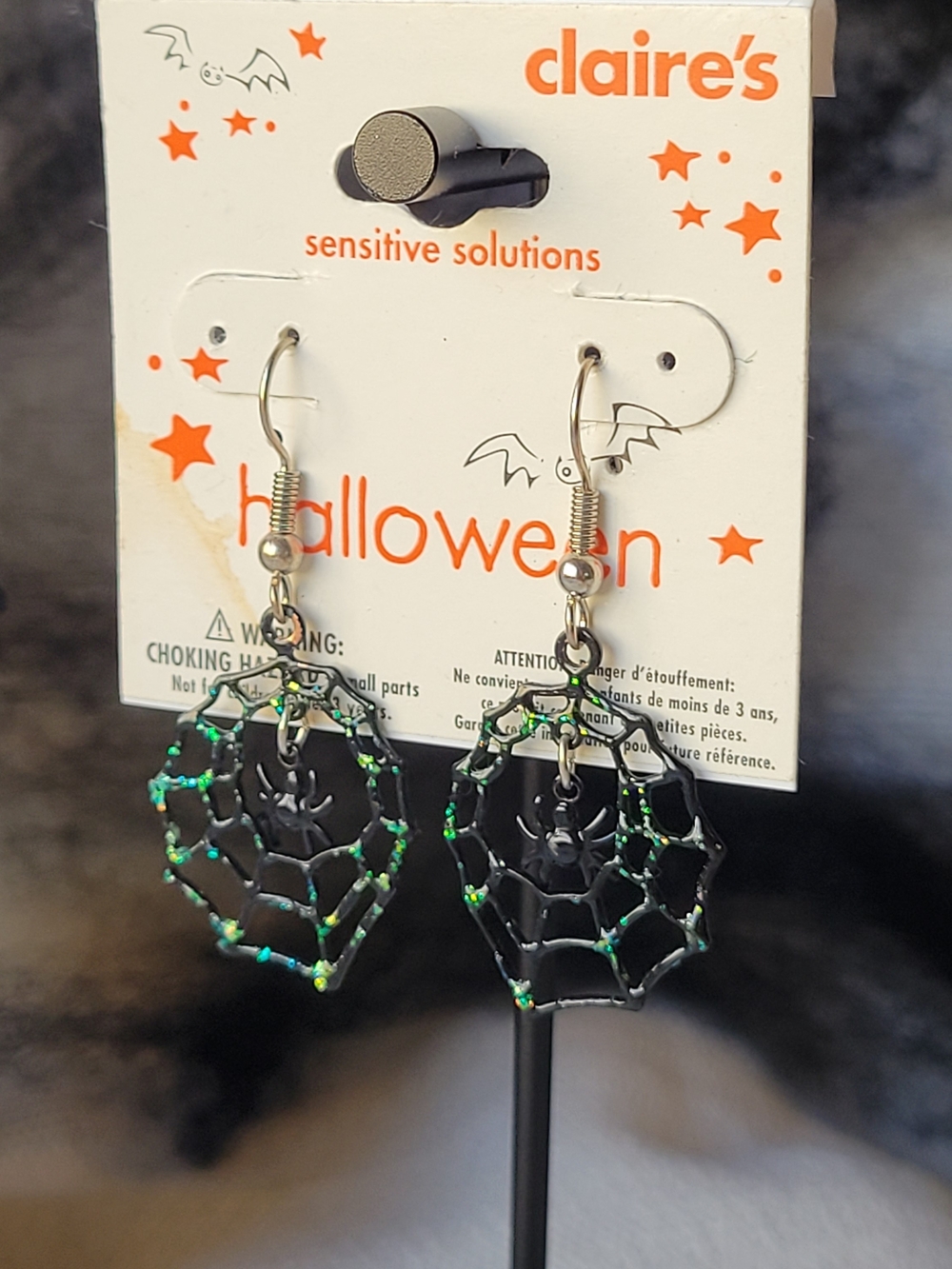 Claire's Spiderweb Dangle Earrings with an Iridescent Green Shimmer